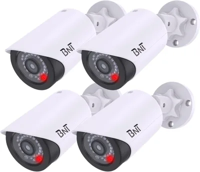 BNT Cámara de seguridad falsa con LED rojo nocturno (paquete de 4, blanco)